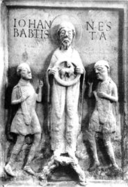 Auf dem Großbirkacher Sandsteinrelief als Grabstein des Abtes Wolfher von Münsterschwarzach (1034-1046) sind zwei Erwachsene in Schwurhaltung zu sehen, die vielleicht gerade dem Heidentum abschwören. In der Mitte Johannes.